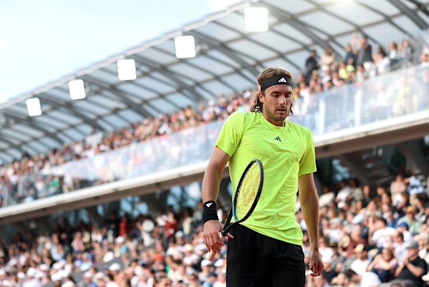Stefanos Tsitsipas of Greece reacts against Matteo Gigante of Italy.
