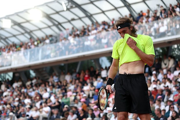 Stefanos Tsitsipas of Greece reacts against Matteo Gigante of Italy.