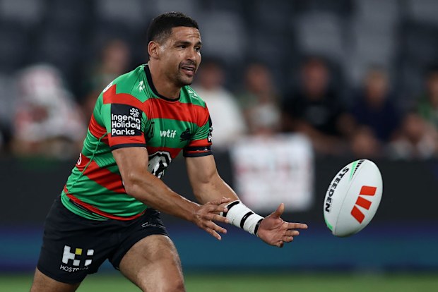 Cody Walker of the Rabbitohs passes the ball.