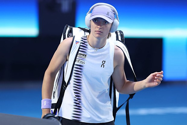 Iga Swiatek of Poland enters the court.