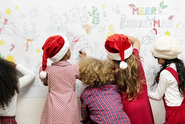 Kids drawing on a Christmas decoration