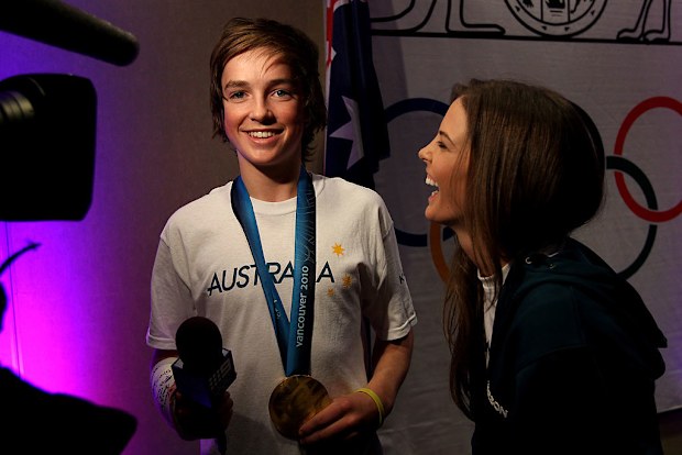 Torah Bright of Australia celebrates her gold medal with Scotty James in 2010 in Vancouver.