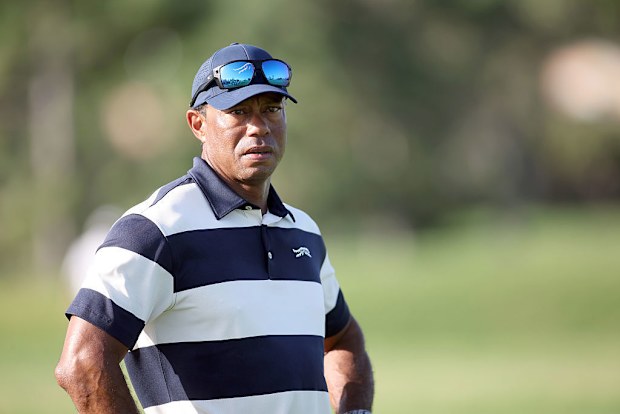Tiger Woods watches his son Charlie Woods play during the first round of the U.S. Junior Amateur at Brook Hollow Golf Club.