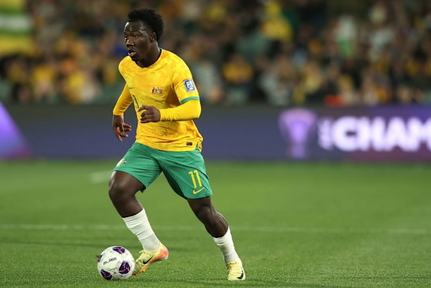 Nestory Irankunda of the Socceroos dribbles the ball during the third round FIFA World Cup 2026 Qualifier match against China PR.