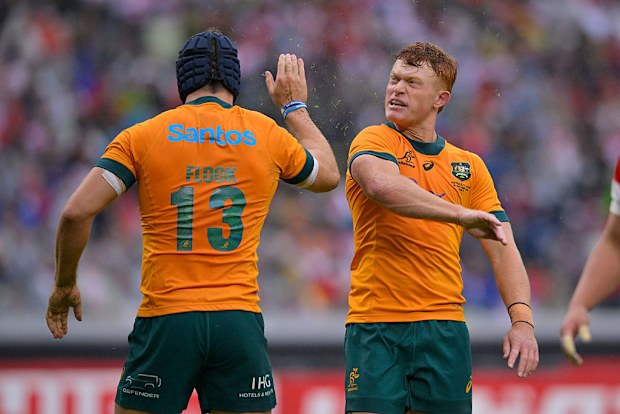 Josh Flook of Australia celebrates scoring with teammate Tane Edmed.