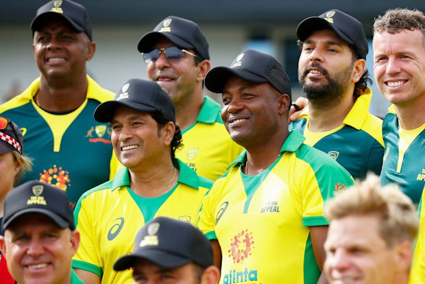 Sachin Tendulkar (centre left) and Brian Lara (centre right) look on at the Bushfire Cricket Bash T20 match.