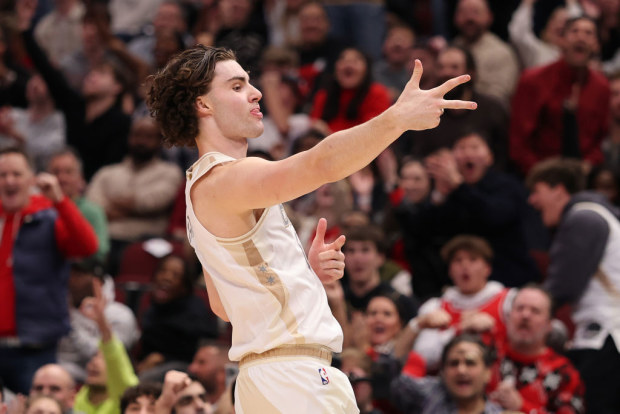 Josh Giddey #3 of the Chicago Bulls celebrates a three pointer against the Milwaukee Bucks.