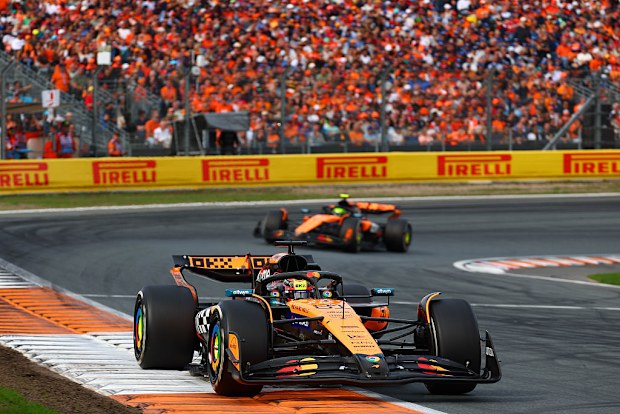 Oscar Piastri of Australia leads Lando Norris of Great Britain during the F1 Grand Prix of Netherlands at Circuit Zandvoort.