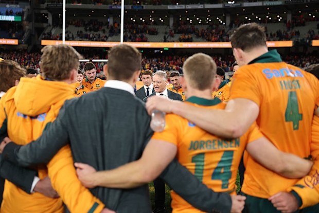 Joe Schmidt of the Wallabies speaks to his players following the second Test.