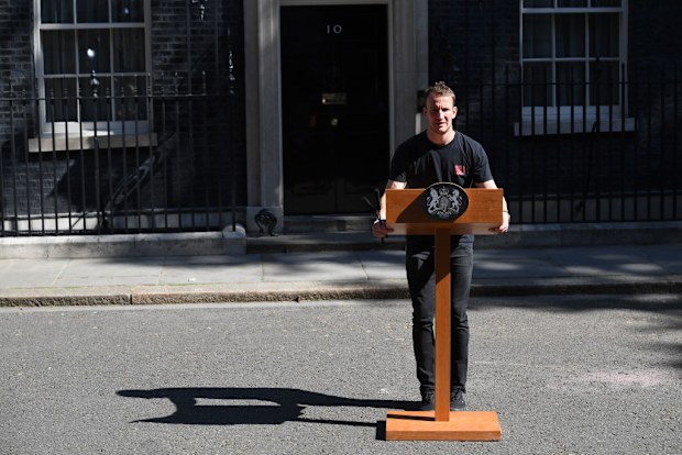 Theresa May hot podium guy
