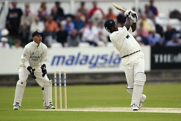 Carl Hooper hits out during the C & G Trophy match.