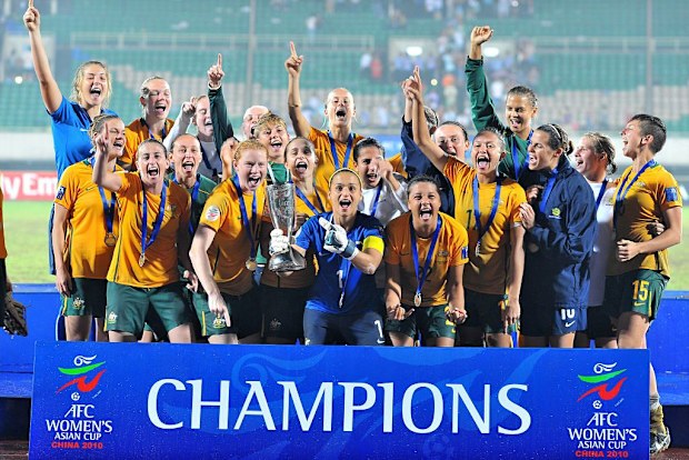Players of Australia celebrate with the trophy after the AFC Women's Asian Cup Final between Australia and D.P.R. Korea.