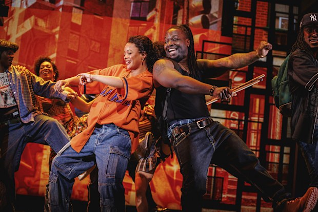 This image released by Polk & Co. shows Maleah Joi Moon, left, and Chris Lee during a performance of "Hell's Kitchen." 