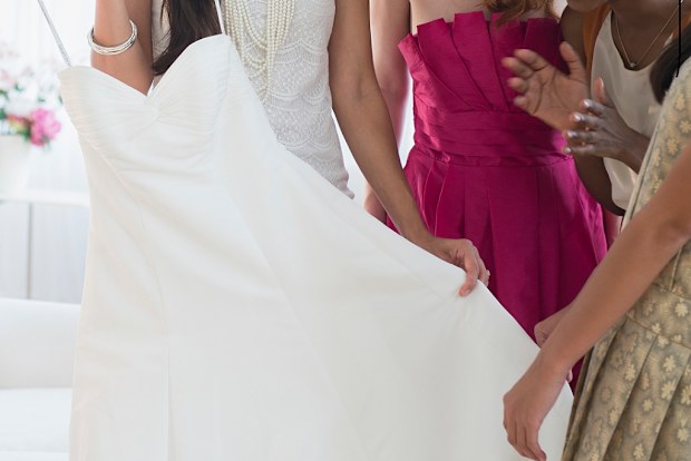 Trying on wedding gowns
