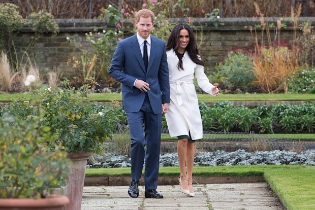 Harry and Meghan attend a photocall in the Sunken Gardens at Kensington Palace following the announcement of their engagement on November 27, 2017.
