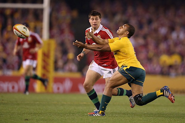 Ben Youngs of the Lions applies pressure on Australia's Will Genia in 2013 in Melbourne.