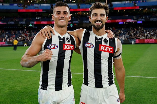 Nick Daicos (left) and brother Josh Daicos celebrate after a game together.