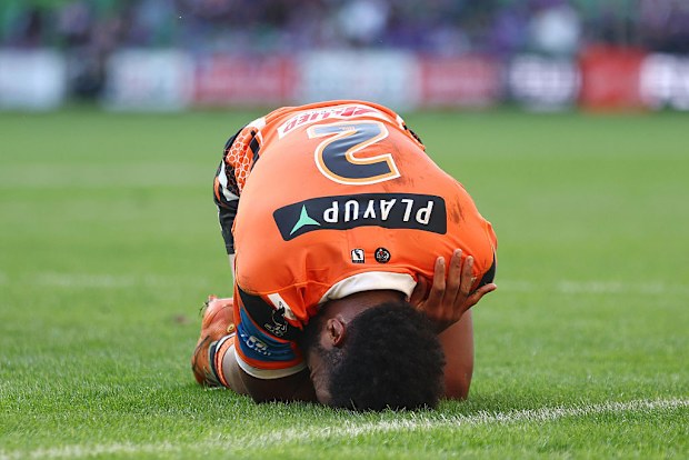 Sunia Turuva of the Tigers goes down.