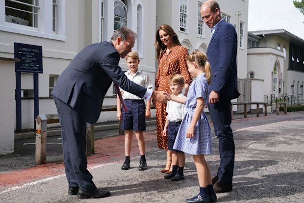 Prince George, Princess Charlotte and Prince Louis (C), accompanied by their parents the Prince William, Duke of Cambridge and Catherine, Duchess of Cambridge