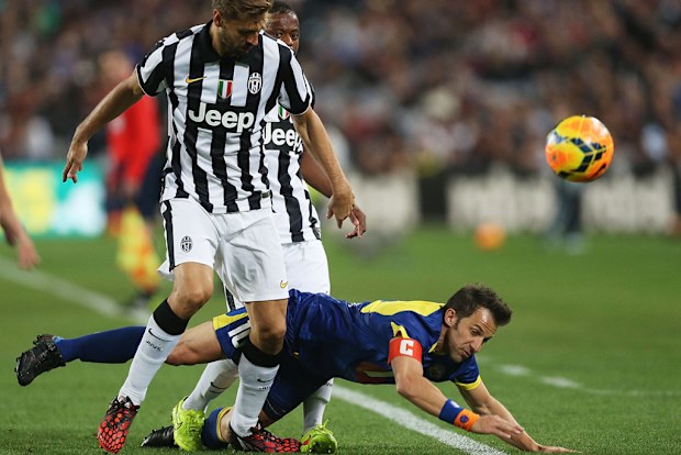 Alessandro Del Piero of the All Stars is challenged by Fernando Llorente and Patrice Evra of Juventus during the match. (Getty Images)