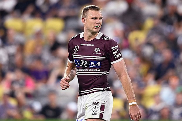 Tom Trbojevic of the Sea Eagles looks on.