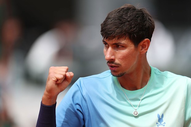 Alexei Popyrin of Australia celebrates a point against Alejandro Tabilo of Chile.
