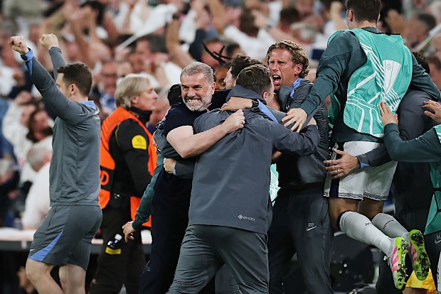 Tottenham Hotspur manager Ange Postecoglou celebrates his team's opening goal.
