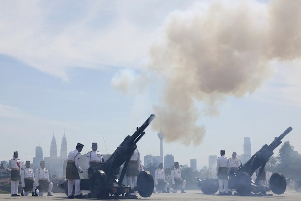 Army soldiers fire cannons during a welcoming ceremony of the 17th King of Malaysia, Sultan Ibrahim Iskandar at National Palace in Kuala Lumpur, Malaysia Wednesday, Jan. 31, 2024.  