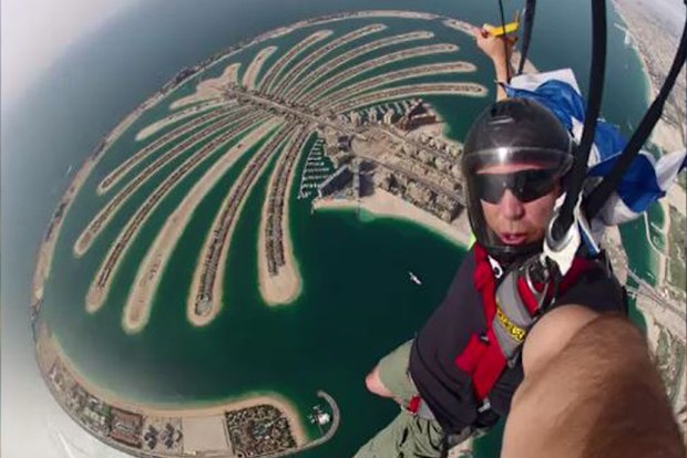 A witness says Tony Rokov twisted his body to save his teenager tandem partner during a skydiving accident yesterday which took his life. (Supplied)