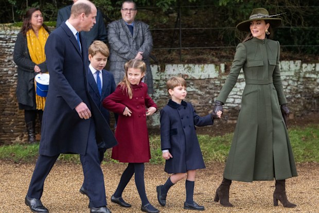 SANDRINGHAM, NORFOLK - DECEMBER 25:  Prince William, Prince of Wales, Prince George, Princess Charlotte, Prince Louis and Catherine, Princess of Wales attend the Christmas Day service at Sandringham Church on December 25, 2022 in Sandringham, Norfolk. King Charles III ascended to the throne on September 8, 2022, with his coronation set for May 6, 2023. (Photo by Samir Hussein/WireImage)