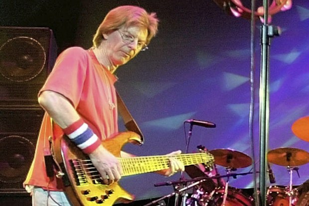 FILE - Phil Lesh, of The Grateful Dead, performs during a reunion concert in East Troy, Wis. on Aug. 3, 2002. Lesh, a founding member of the Grateful Dead, died Friday, Oct. 25, 2024, at age 84. (AP Photo/Morry Gash, File)