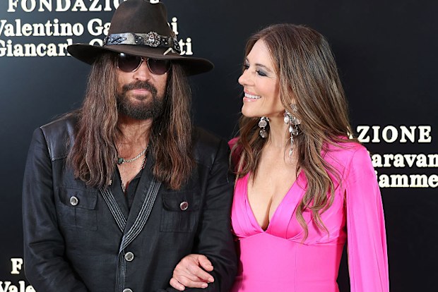 ROME, ITALY - MAY 24: Billy Ray Cyrus and Elizabeth Hurley attend the "Orizzonti | Rosso" Exhibition Opening Dinner at Palazzo Barberini on May 24, 2025 in Rome, Italy. (Photo by Elisabetta A. Villa/Getty Images)