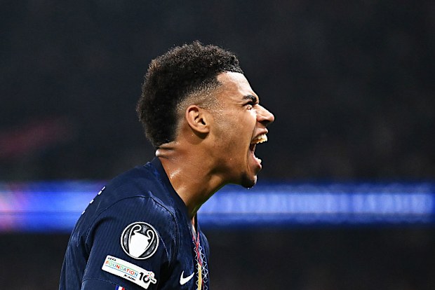 Desire Doue of Paris Saint-Germain celebrates scoring his team's first goal.