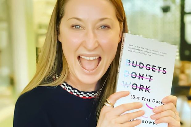 Melissa Browne holding new book