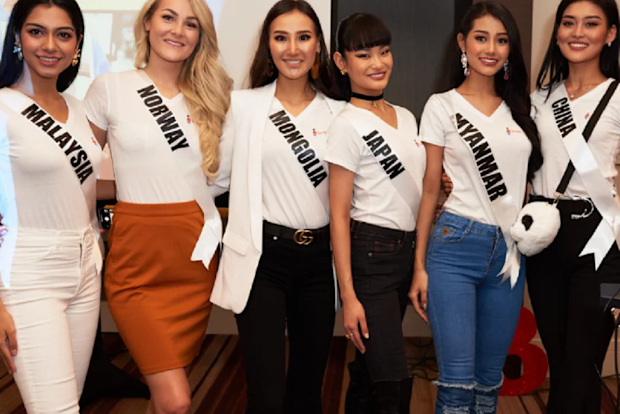 Htet (second from right) pictured with fellow Mis Universe contestants.