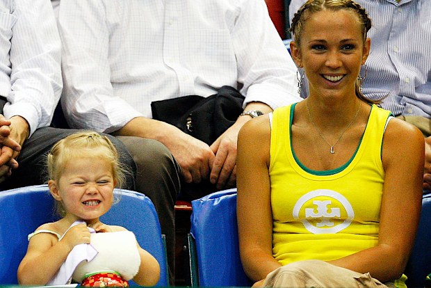 Bec Hewitt and daughter Mia Hewitt watch the action during day one of the Davis Cup tie between Australia and Thailand April 11, 2008 in Townsville.