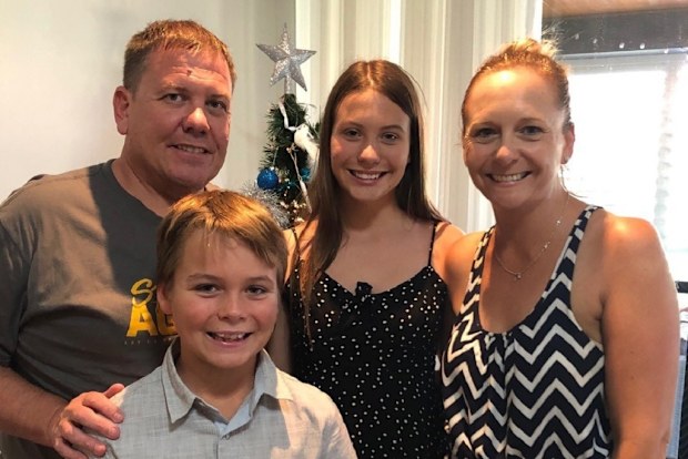 Tracey Lewis with her family today. 