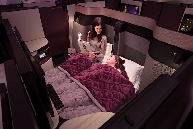 QSuite on Qatar Airways features the option to convert two seats into a double bed.