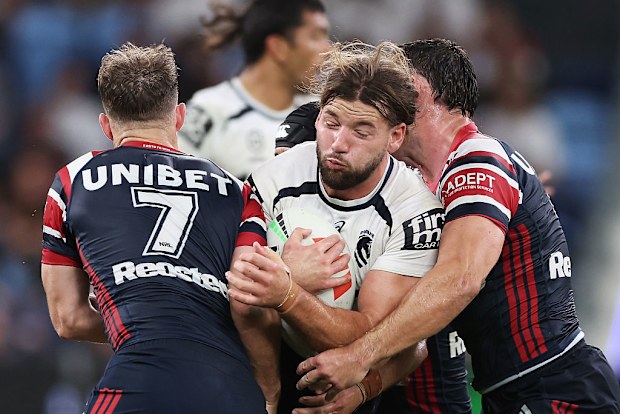 Patrick Carrigan is tackled.