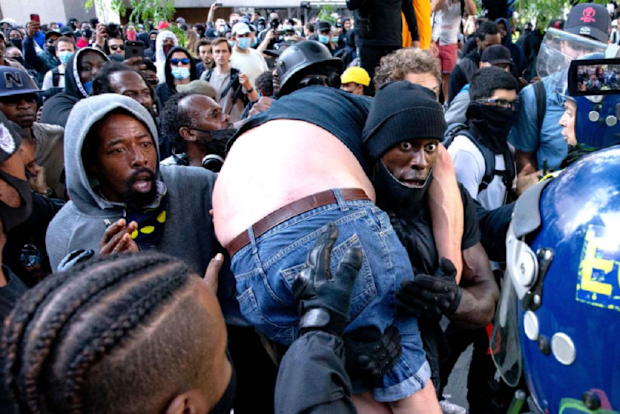 Hutchinson helped the protestor in June in London.