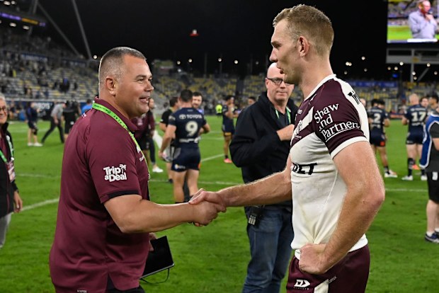Sea Eagles coach Anthony Seibold celebrates with Tom Trbojevic.