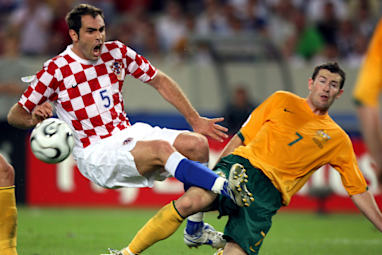 Croatia's Igor Tudor and Australia's Brett Emerton.