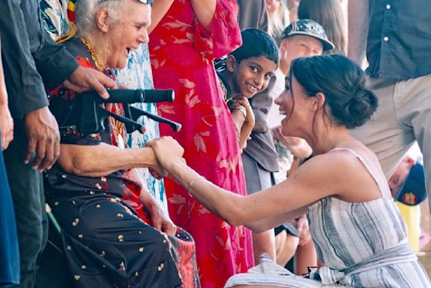 Meghan greeting fans during the royal tour of the Pacific.