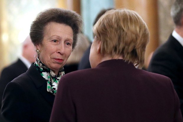 Princess Anne speaking with German chancellor Angela Merkel at the NATO summit.