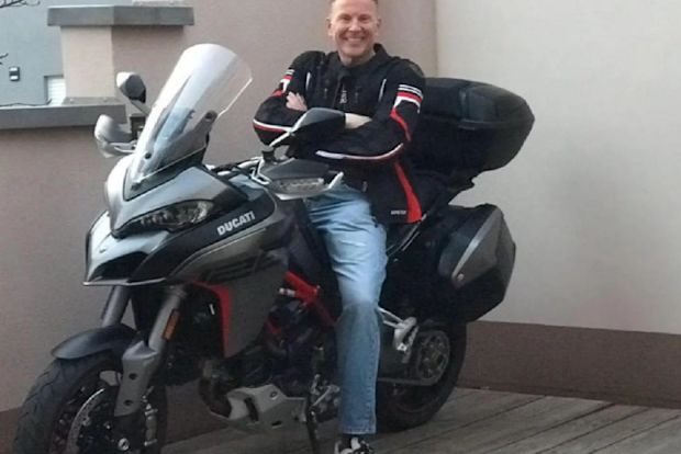The prince pictured on his Ducati a week before his death.