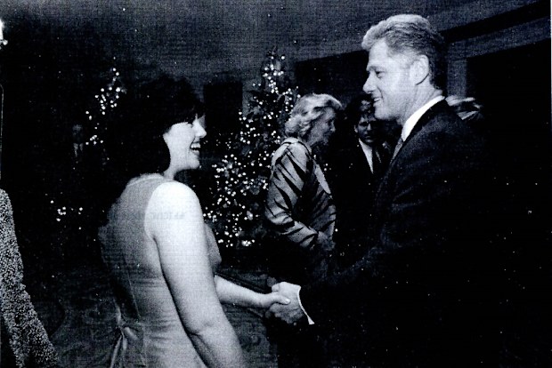 Monica Lewinsky meeting President Bill Clinton at a White House function.
