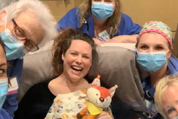 Bob Conlin sign to wife nurses deliver gifts and food to wife