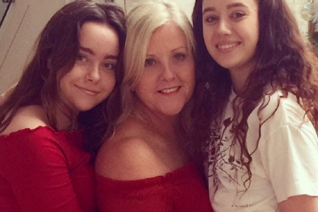 Tracy with her children Olivia, 22, and Millie, 14.