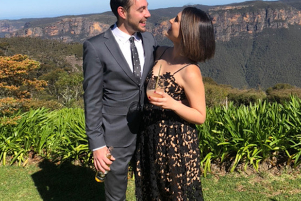 COVID wedding couple  at function