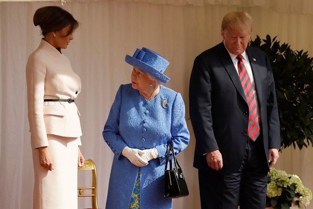 Britain's Queen Elizabeth II speaks to first lady Melania Trump, in July, 2018.